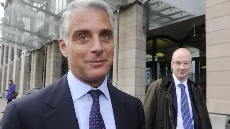 epa03528729 Andrea Orcel (L) the head of the UBS investment bank, and Andrew Williams (R) Global head of Compliance leave Portcullis House after giving evidence to the UK Parliamentary banking inquiry on Libor interest rates in London, Britain, 09 January 2013. EPA/FACUNDO ARRIZABALAGA
