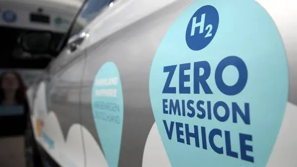epa09317867 The inscription 'Zero Emission Vehicle' is seen on a hydrogen vehicle at the hydrogen production plant of Shell in Wesseling, Germany, 02 July 2021. German Christian Democratic Union (CDU) leader Armin Laschet opens Europe's largest green hydrogen production plant. EPA/FRIEDEMANN VOGEL