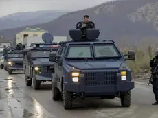 epa06630843 A convoy with Kosovo's police special unit carrying detained head of the Serbian government's Office for Kosovo, Marko Djuric, in Mitrovica, Kosovo, 26 March 2018. Kosovo Police special unit detained head of the Serbian governmentÃs Office for Kosovo, Marko Djuric, in northern city of Mitrovica for entering Kosovo despite a ban on his presence. EPA/VALDRIN XHEMAJ