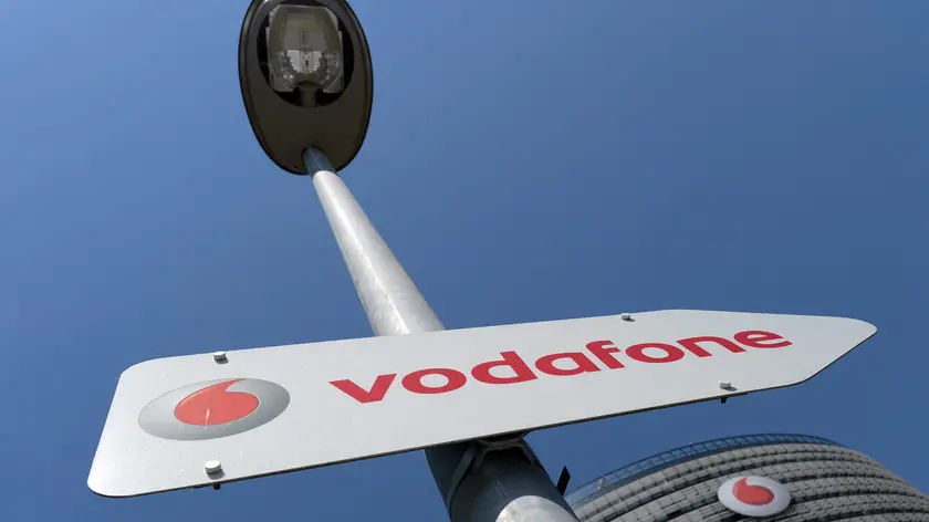 epa04215862 A direction sign leads to Vodafone's Germany headquarters in Duesseldorf,??Germany, 20 May 2014. Vodafone Germany presented the telecommunicaton company's business figures and sketched out the future strategy. EPA/FEDERICO GAMBARINI