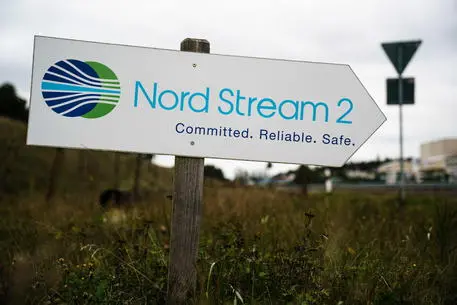 A sign reading Â?Nord Stream 2 - Committed. Reliable. Safe.Â? picutured near the pipeline landfall facility after a visit of Mecklenburg-Western Pomerania State Premier Manuela Schwesig (not in the picture) to the industrial port and the landfall facility of the joint German-Russian pipeline project Nord Stream 2, in Lubmin, Germany, 15 October 2020. The politically controversial pipeline project was put into question in response to the alleged poisoning of Kreml critic Alexei Navalny. Schwesig wants to save the gas pipeline that she regards an important infrastructure project. ANSA/CLEMENS BILAN