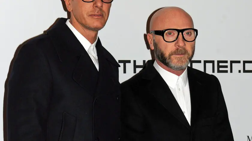(FILE) The file picture dated 23 February 2011 shows Italian fashion designers Domenico Dolce (R) and Stefano Gabbana (L) arriving for an event during the Milano Moda Donna Fashion Week in Milan, Italy. Dolce and Gabbana have been sentenced to probation for tax evasion. A judge in Milan on 19 June 2013 imposed against both sentences of one year and eight months, that are suspended. ANSA/MILO SCIAKY