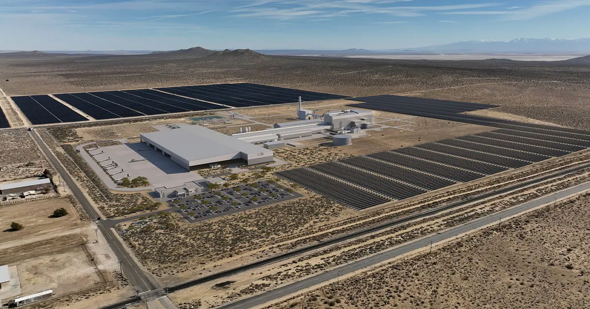 Il rendering di un'acciaieria con annesso parco fotovoltaico